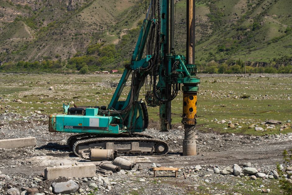 A borehole drilling rig at work